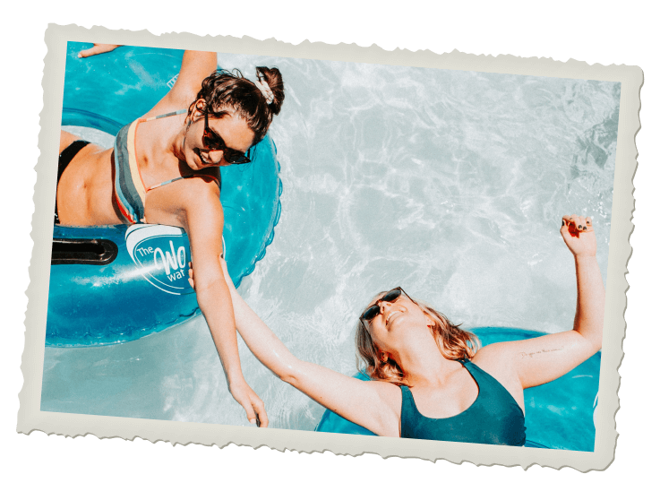 friends-enjoying-pool-on-floats